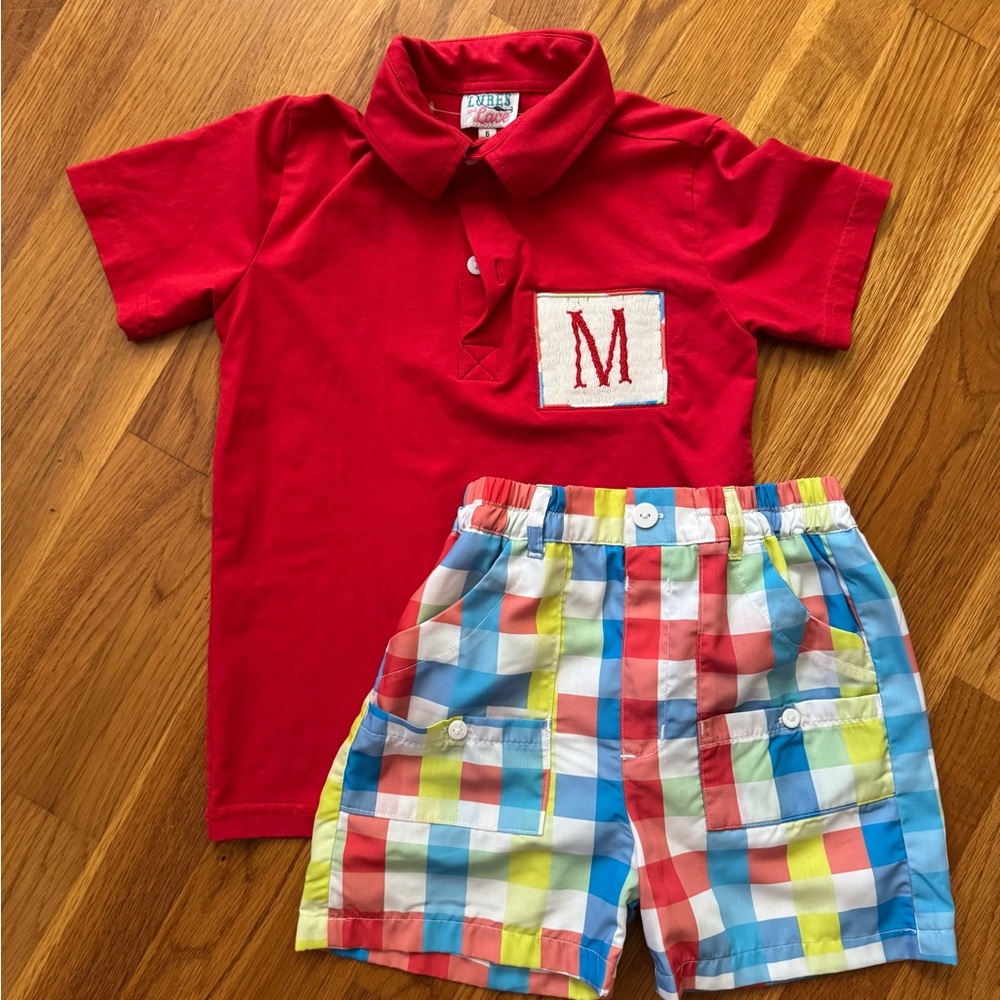 Vibrant Red Polo Shirt with Colorful Plaid Fishing Shorts for Casual Style